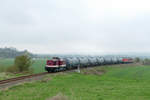Die EBS 110 001 war am 19.04.2021 bei Kleinjena mit Kesselwagen und den FWK-Loks 143 848 + 243 936 Richtung Karsdorf unterwegs.