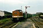 DR 110 411-6 mit einem Personenzug am 15.06.1981 in Halberstadt.