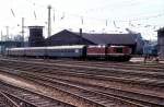 DR 110 082-5 mit einem Personenzug aus Richtung Nebra, am 08.05.1991 bei der Einfahrt in Naumburg Hbf.