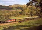 Die von Sangerhausen nach Wei�enfels umbeheimatete DB 202 721-7 f�hrte am 17.10.1994 den N 14620 (Teuchern - Nebra) bei Laucha durchs herbstliche Unstruttal.