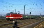 DR 243 255-7 mit einem Personenzug Richtung Bad K�sen, am 23.02.1990 bei der Ausfahrt in Naumburg Hbf.